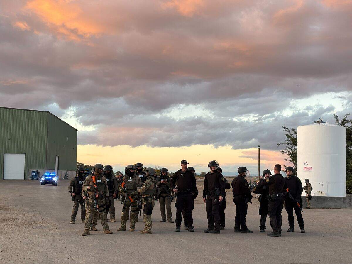 Agents stand at La Catedral Arena in Wilder.