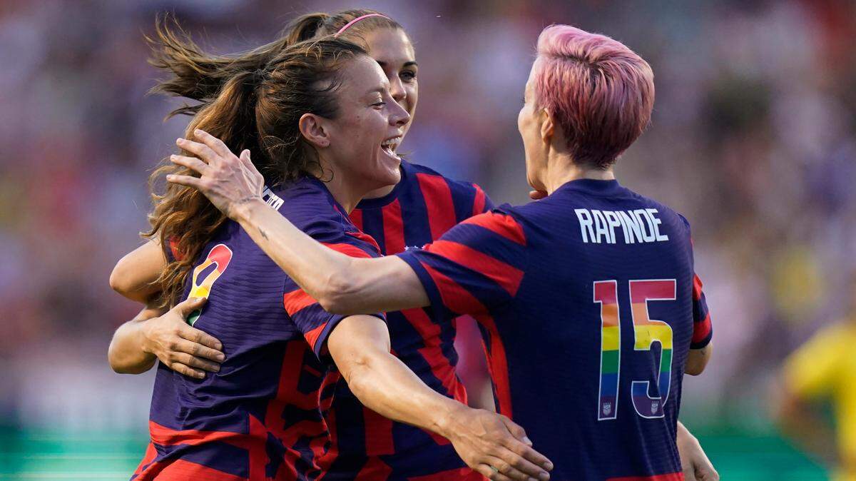 U.S. defender Sofia Huerta, left, forward Alex Morgan, rear, and forward Megan Rapinoe celebrate after a first-half goal against Colombia during an international friendly soccer match in June.