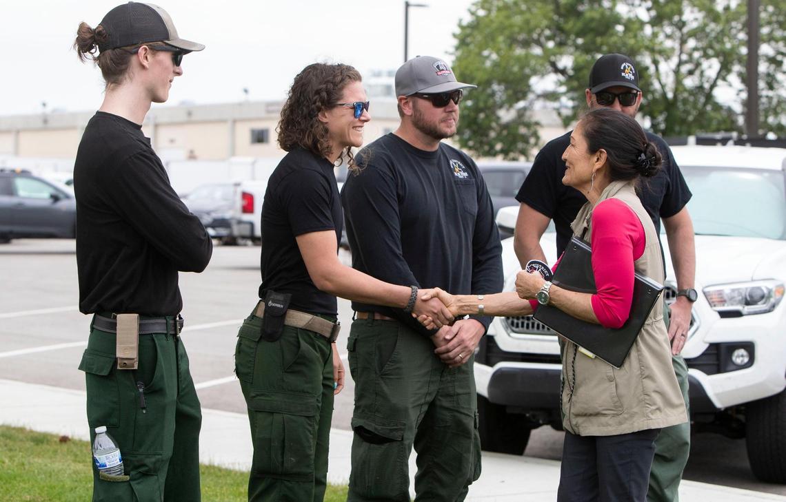 Secretary of Interior Deb Haaland meets with with Boise District BLM firefighters Jake Vincent, left, Sarah Peterson, Chad Niblett and Dustin Zahrt, right.