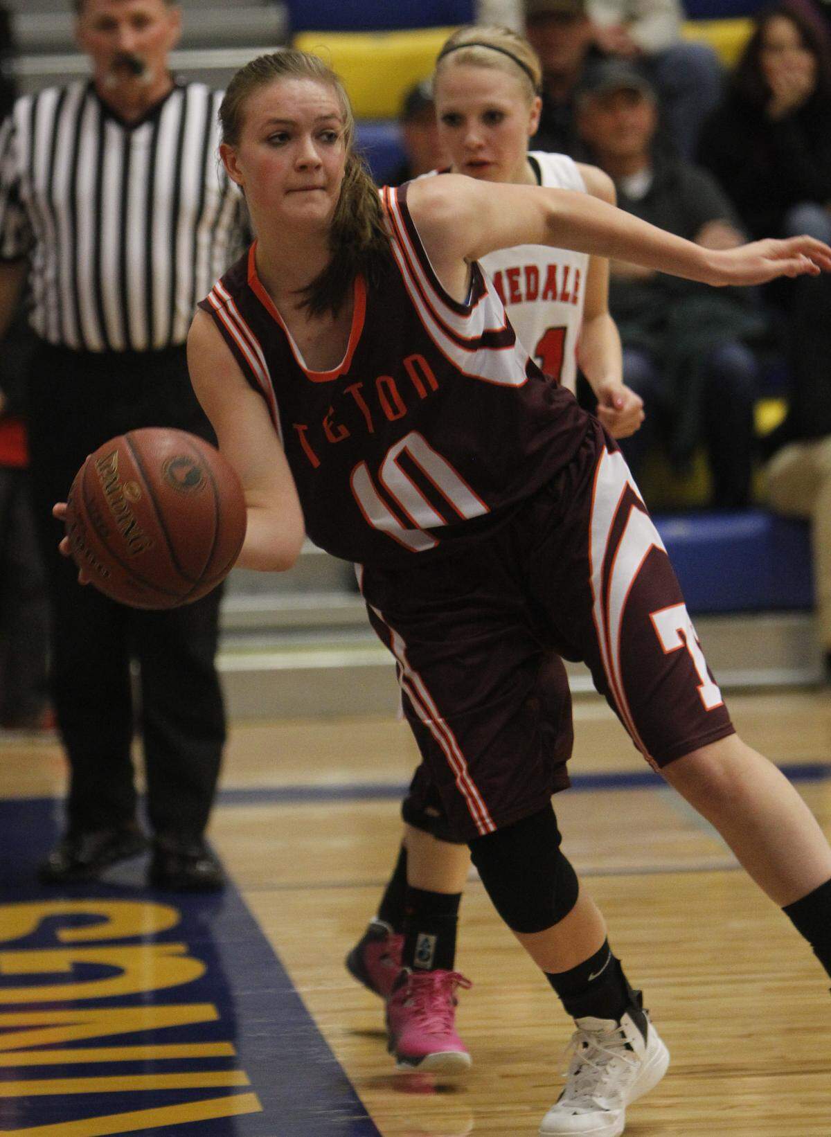 Teton has phased out using Redskins on its jerseys since controversy around the mascot first swirled in 2013. Above, the Teton girls basketball team competes against Homedale during the first round of the 3A state tournament in 2014.