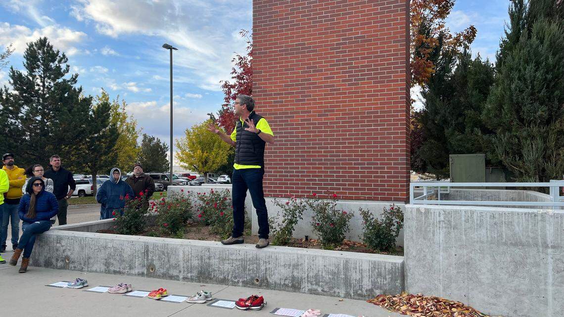 David Binetti speaks to a crowd of parents calling for West Ada School Board Chair Amy Johnson to recuse herself from public health decisions.