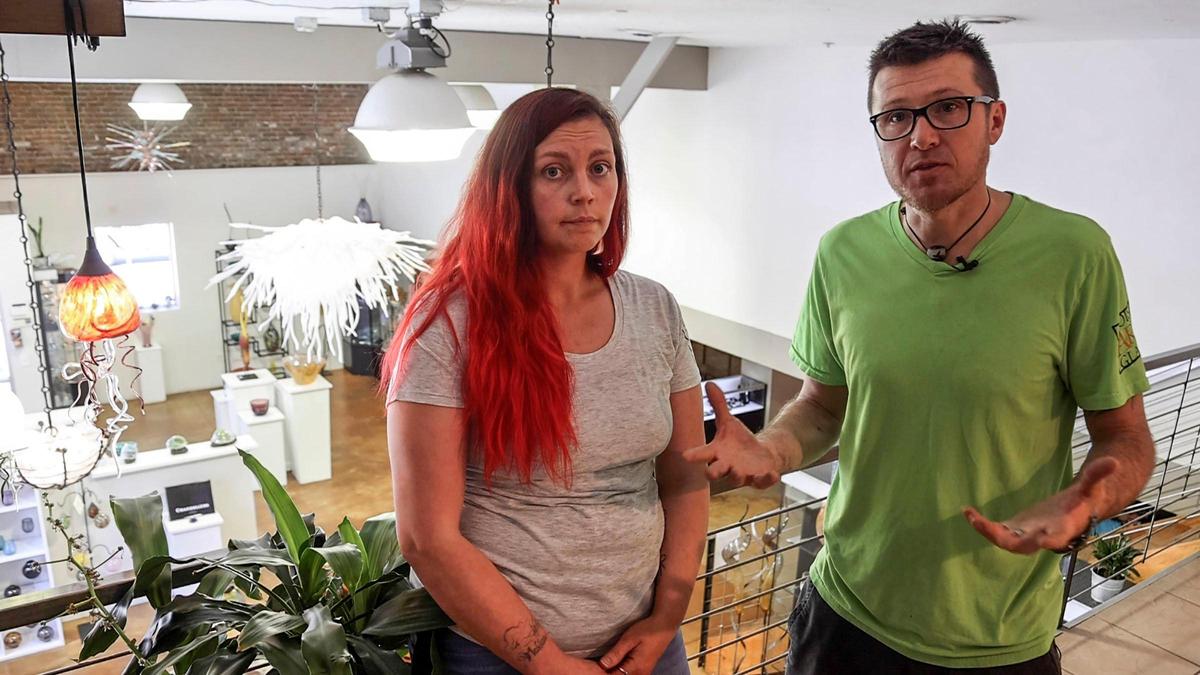 Boise Art Glass owner Filip Vogelpohl, right, and general manager Malisa Scott, say they and other small businesses are getting squeezed out of downtown Boise. Their parking location for employees has changed twice this year to make room for new developments. They said off-street parking is disappearing, and fees to park in a garage are unaffordable for employees struggling to pay steep rent in a inflationary economy.