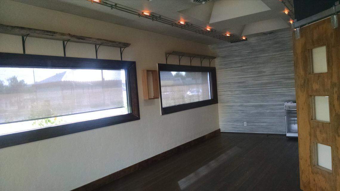 The small dining area at the restaurant has been cleared of furniture and decor.