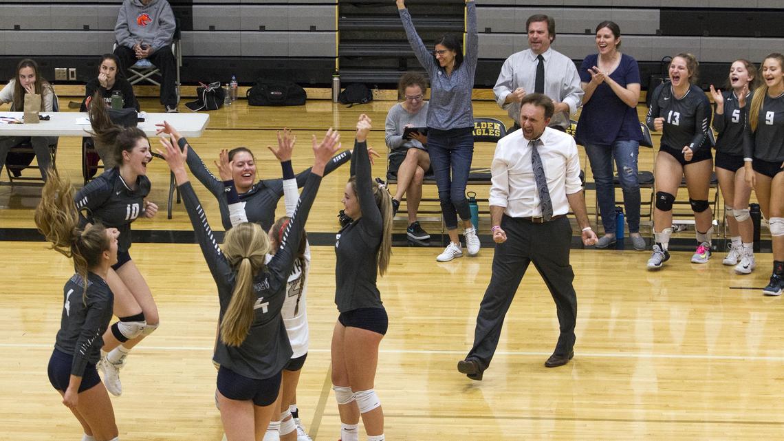 Skyview celebrates after defeating Timberline 14-25, 25-15, 25-17, 25-13 in the 5A District Three volleyball championship Thursday at Capital High.