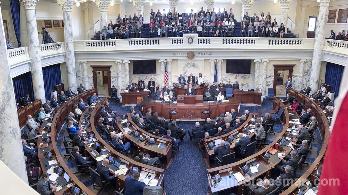 The Idaho Legislature, joined by justices of the Idaho Supreme Court and elected officials, gather in the House Chambers to hear Gov. Brad Little delivers his State of the State address Monday, Jan. 10, 2022 at the Statehouse in Boise. Two Idaho Democrats tested positive for COVID-19 on Wednesday.