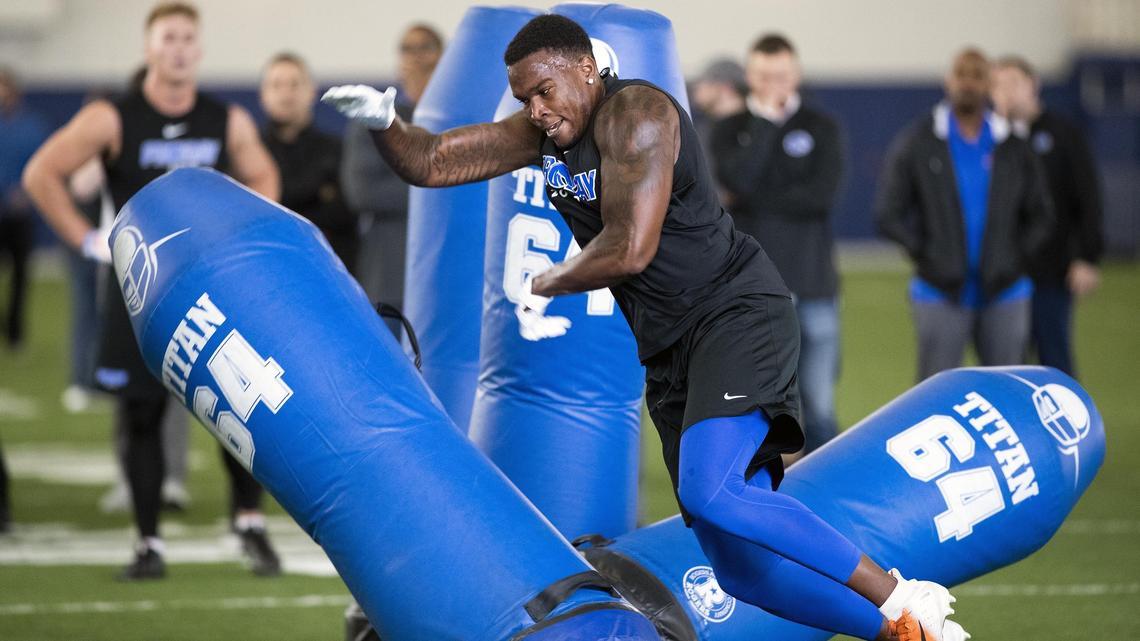 Former Boise State defensive end Jabril Frazier plows through blocking dummies as NFL scouts assess his skills at Pro Day Tuesday, April 2, 2019.