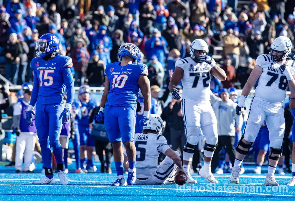 Boise State linebacker Andrew Simpson reacts after a tackle during their football game against Utah State at Albertsons Stadium on Friday, Nov. 25, 2022.