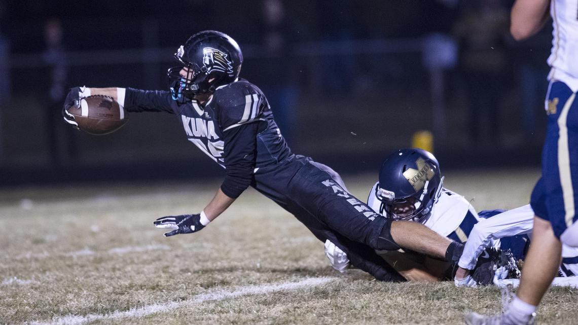 Kuna running back Jonathan Edwards stretches the football across the goal line to put the Kavemen up 35-20 over Middleton. The two Treasure Valley teams were playing in the 4A football state semifinals Friday at Kuna.
