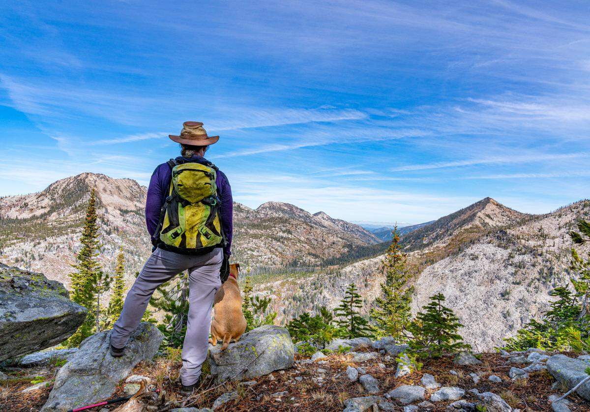 John Platt and his dog, Ruby, enjoy the view of the Lick Creek range near McCall. The Lick Creek mountains were a favorite location for Platt, who died Feb. 8 of a heart attack.