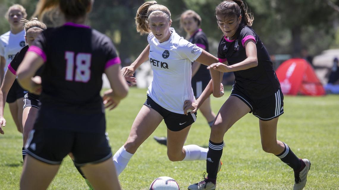Avery McBride dribbles through the Billings United defense on the way leading the Boise Thorns’ U-14 girls soccer team to a 3-0 victory on Wednesday at the Far West Regional Championships.