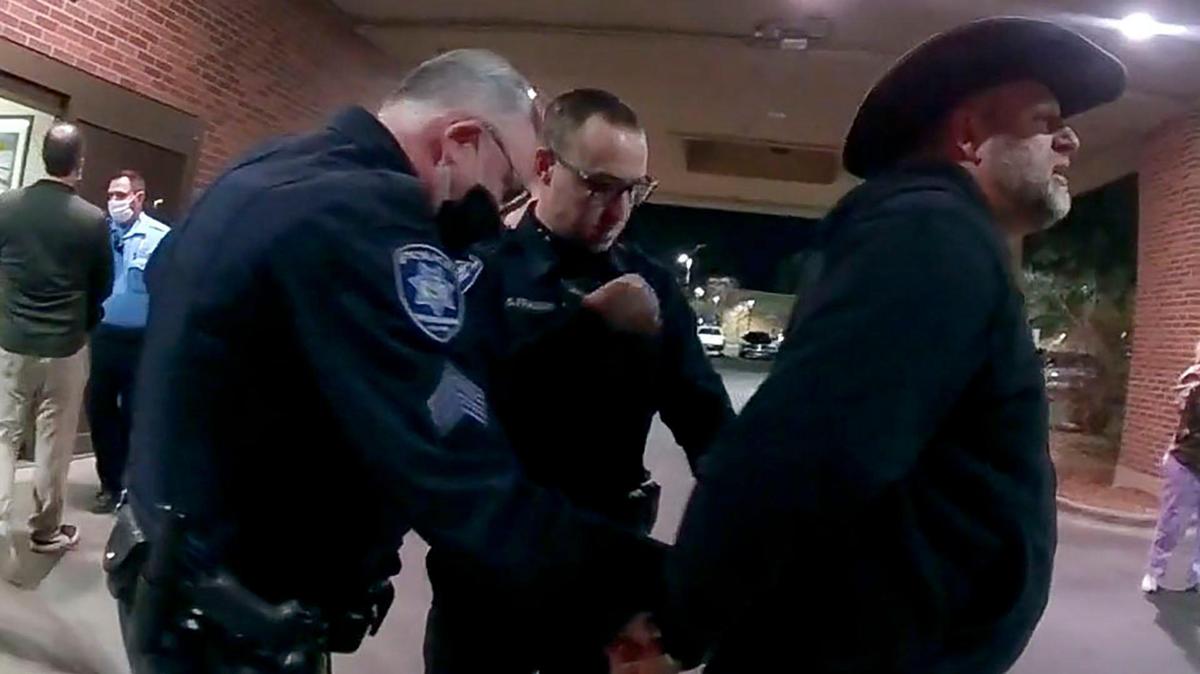 Boise police arrest Ammon Bundy while he led a protest outside St. Luke’s hospital in downtown Boise in March 2022.