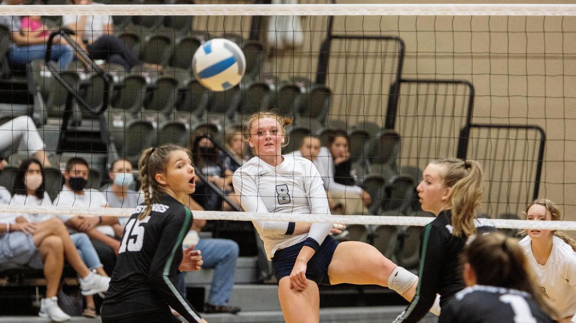 Skyview’s Alex Bower spikes the ball past Eagle on Tuesday at Northwest Nazarene University’s Johnson Center in Nampa. Skyview has spent the season on the road after a storm ruined the Hawks’ home gym in August.