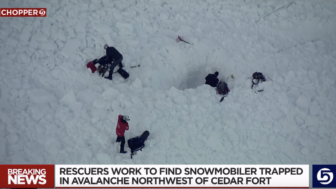 Rescuers quickly determined that the snowmobiler was buried under more than 22 feet of snow
