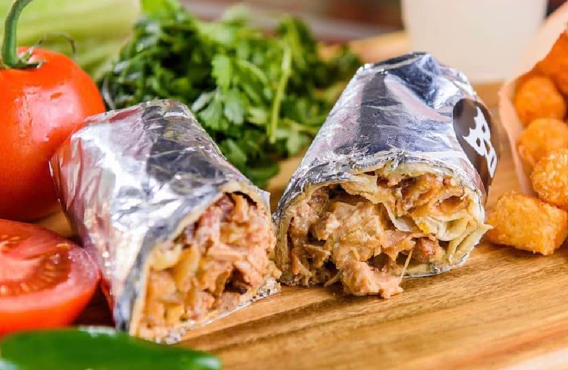 The Smokehouse ($11.50) includes smoked chicken, chunky bacon, onion rings, Sweeto’s three-cheese blend and cilantro-ranch dressing.