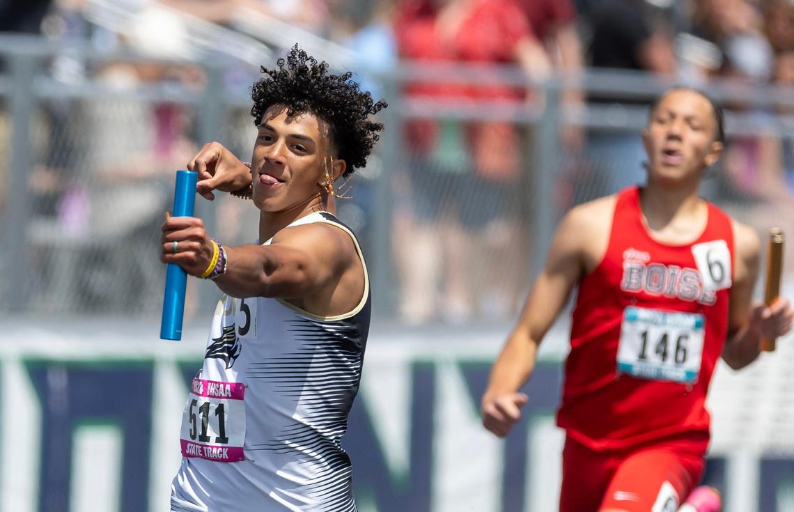 Kuna’s Myles Johnson-Nicholson celebrates winning the 5A boys 4x200-meter relay.
