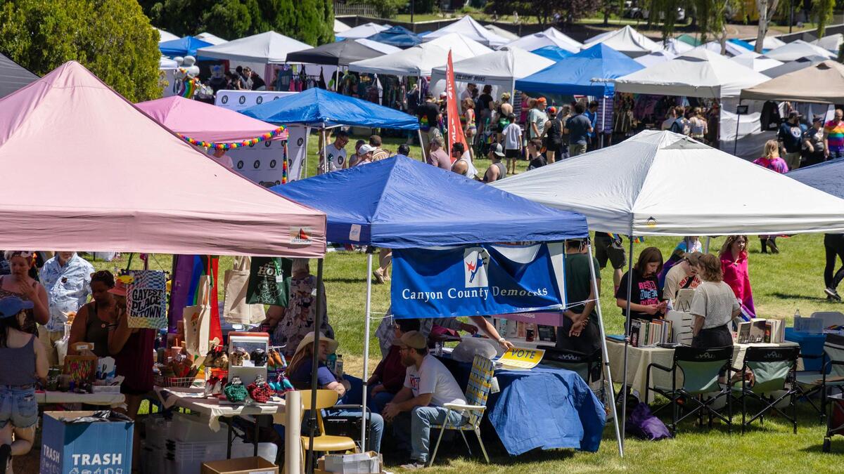 People check out vendor booths at Canyon County Pride at Lakeview Park.