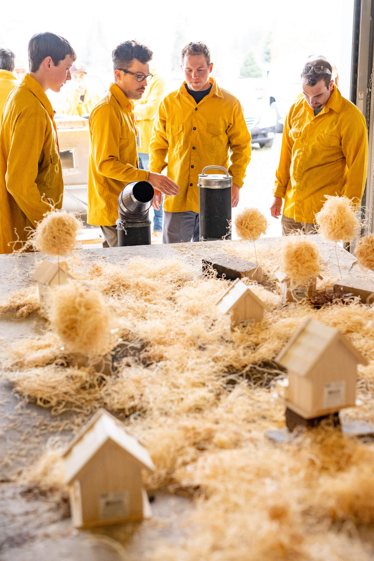 Students tested the ember generator in a fire lab to understand how fires can start and spread.