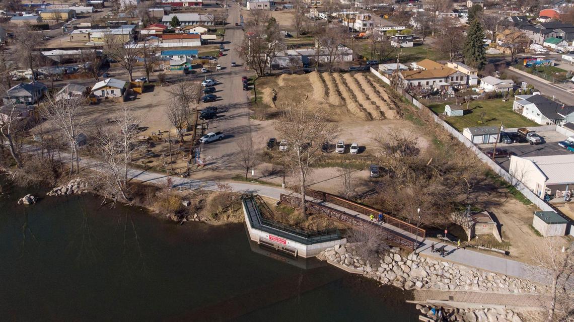 JBI Elemental has proposed two developments near the Boise River Greenbelt in Garden City, along 34th Street (shown) and Carr Street, and along 35th and Carr (top right). The project would include a five-story hotel and residential townhouses — as well as a plaza at the end of 34th Street at the Greenbelt to provide restroom facilities and easy recreational access to the Boise River. The bare land in the foreground where development would occur formerly housed mobile homes.