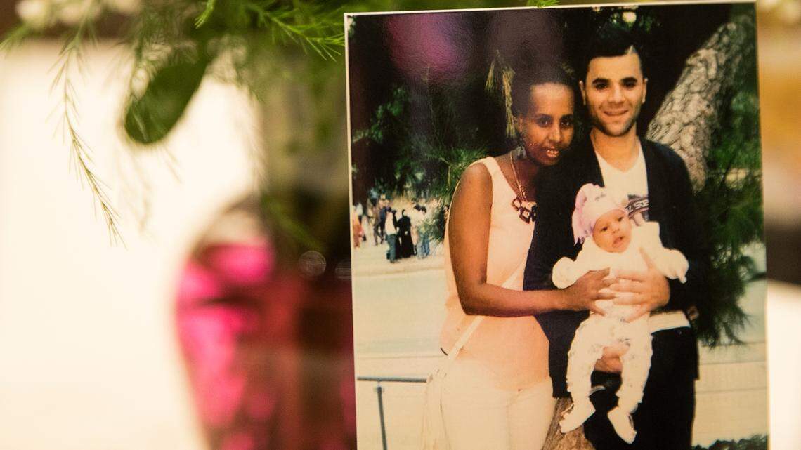 A photo of 3-year-old Ruya Kadir and her parents sits on a table at Kadir’s memorial service July 7 at Boise Centre. Kadir was stabbed at her 3-year-old birthday on Saturday, June 30, and died from her injuries the next day.