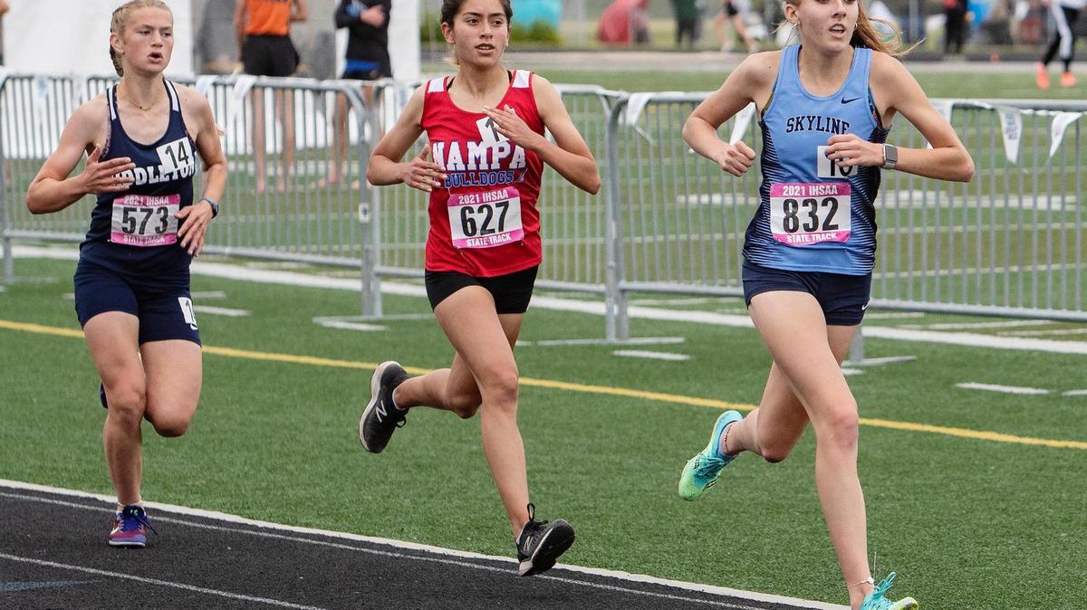 Kayelee Austin of Middleton, Cassandra Vasquez of Nampa and Nelah Roberts of Skyline run the 4A 3,200 meters at the IHSSA track and field state championships held at Eagle High School in 2021. Roberts finished first with Austin in second and Vasquez in third place.