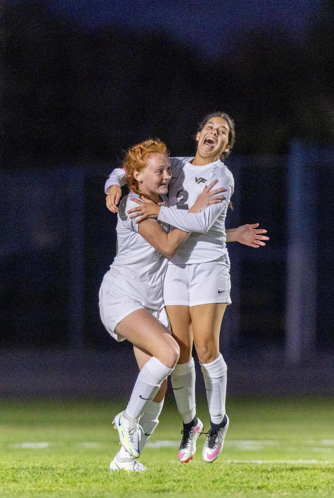 Vallivue’s Jenna Seals, left, celebrates after scoring a goal in the district championship last season.