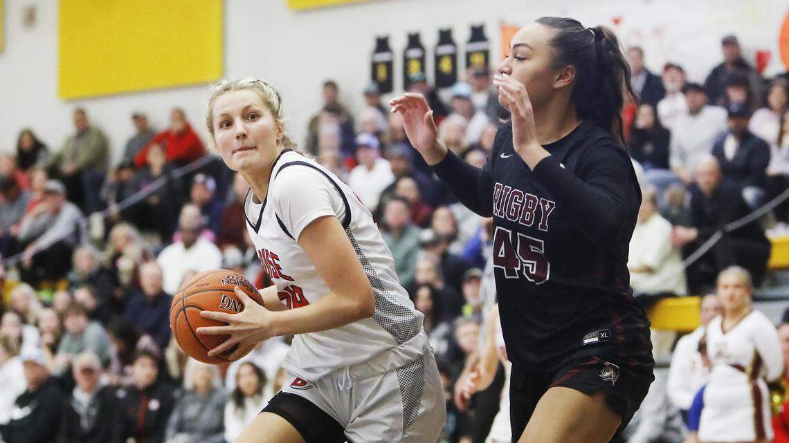 Boise’s Kaity Haan spins past Rigby’s Tiade Togiai in the third-place game of last year’s state tournament.
