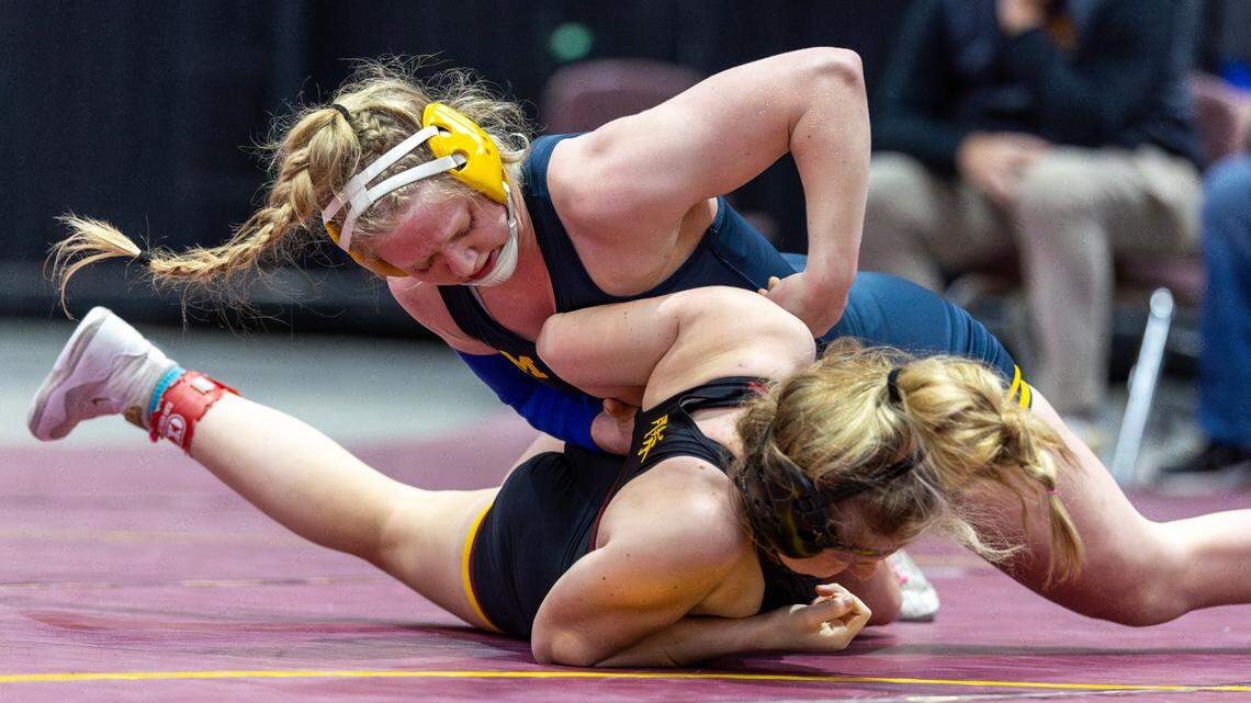 Meridian senior Elise Twait, top, is 41-0 and will chase her third straight state championship this weekend in Pocatello.