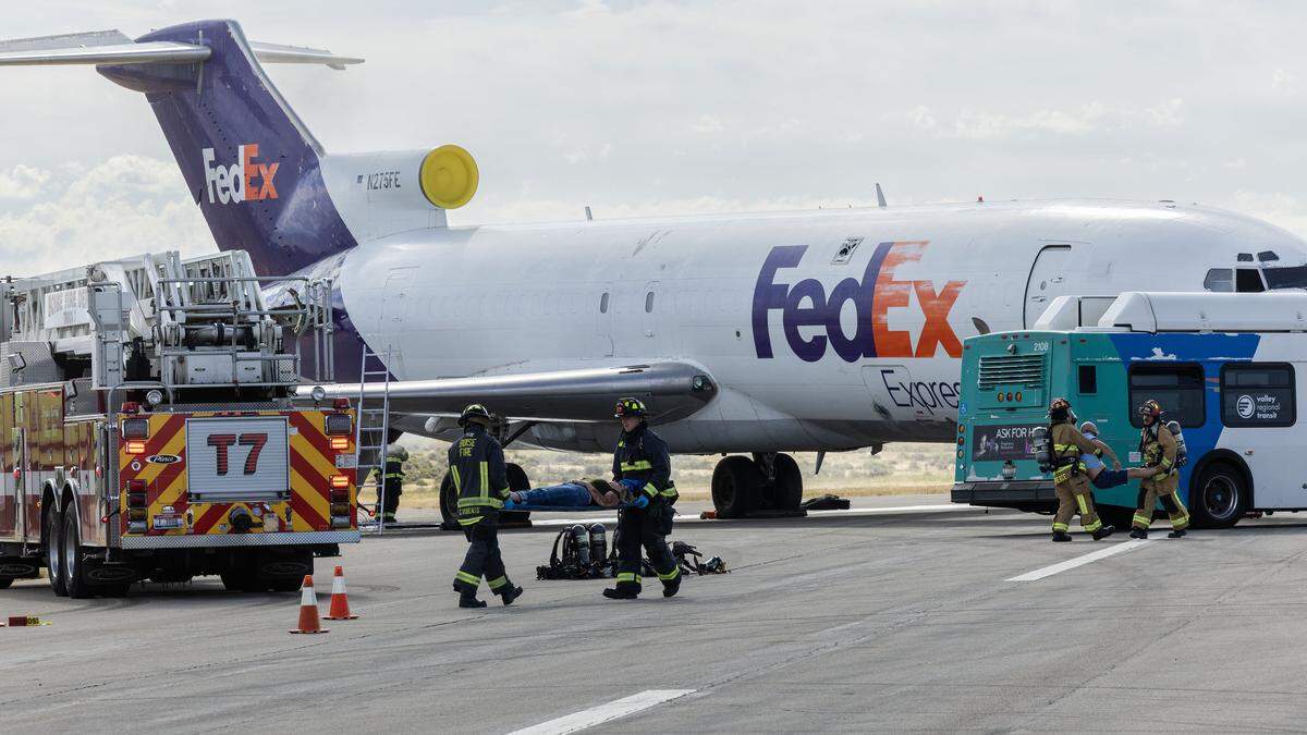 A number of local emergency response teams participate in a mock disaster-Boise Airport Triennial Exercise-south of the airport on Third Runway, Thursday, Aug. 7, 2025.