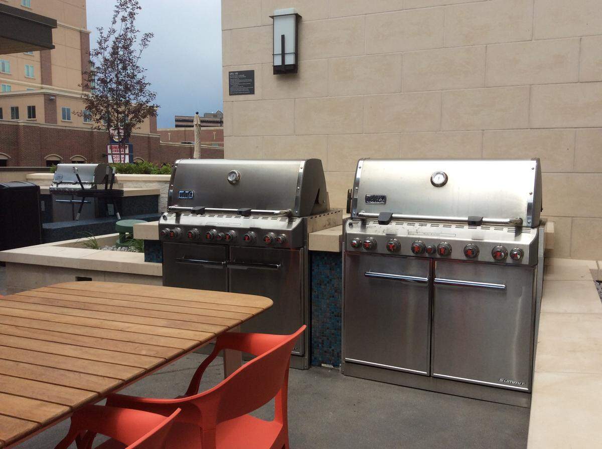 Those Weber grills are way too clean, right? Hotel guests (and even bar customers) are welcome to fire up some food on the roof-deck patio at the Residence Inn by Marriott in Downtown Boise.