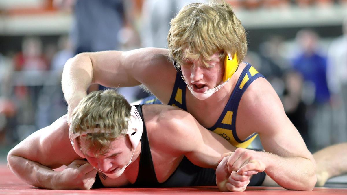 Meridian senior Isaiah Twait, right, is one of four No. 1 seed for the Warriors entering the 5A state tournament this week at the Ford Idaho Center in Nampa.