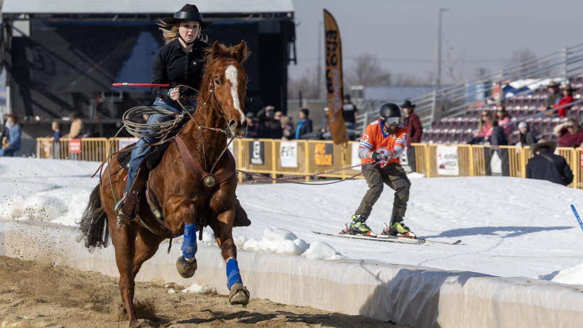 Boise State University student Devon Peterson competes in the pro division with skier Cam Charles during Skijor Boise held at the Ford Idaho Center, Friday, Feb. 6, 2026.
