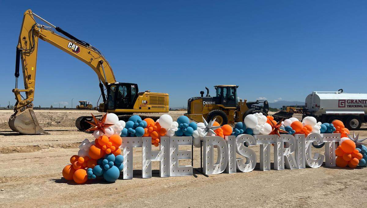 City and county officials hoisted shovels of dirt during the groundbreaking ceremony for The District at Ten Mile.