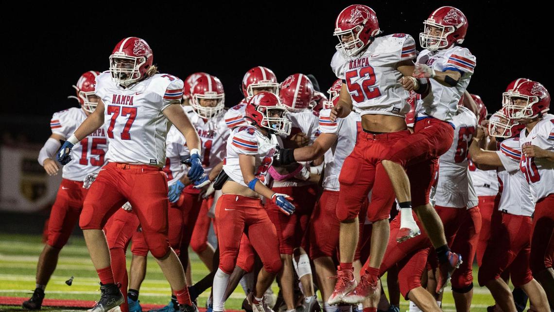 Nampa celebrates after rallying for a 26-24 win at Owyhee on Friday.