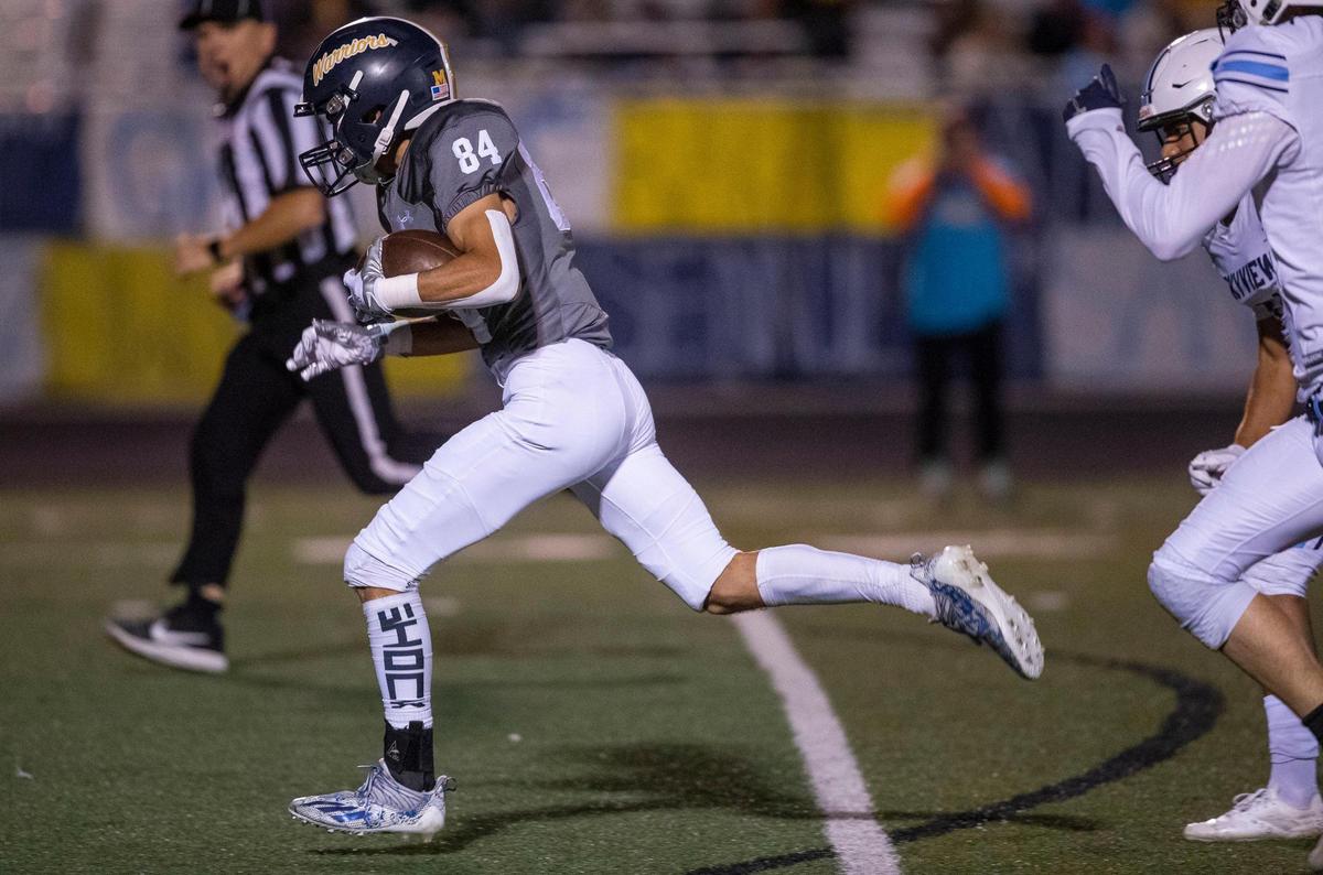 Meridian wide receiver Tyson Acree catches a long touchdown pass in full stride last fall against Skyview.