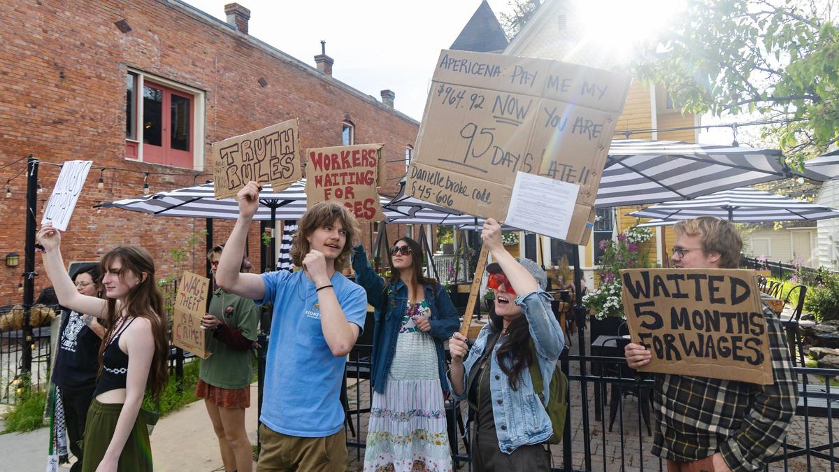 Former employees and supporters picketed Friday in front of Apericena in Boise’s North End. Former employees have accused the restaurant of not paying its workers.