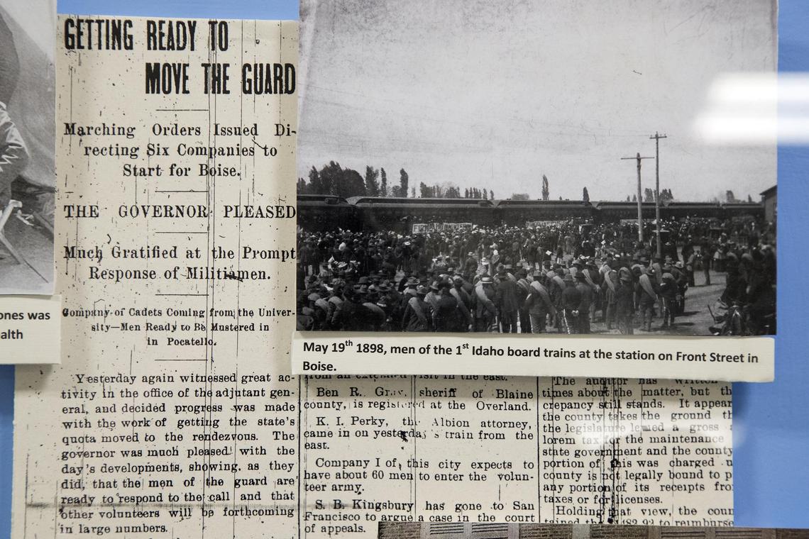 Newspaper clippings from 1898 announce the first deployment of Idaho troops after becoming a state are on display in an exhibit honoring the first soldiers of what became the Idaho National Guard at the Idaho Military Museum in Boise.