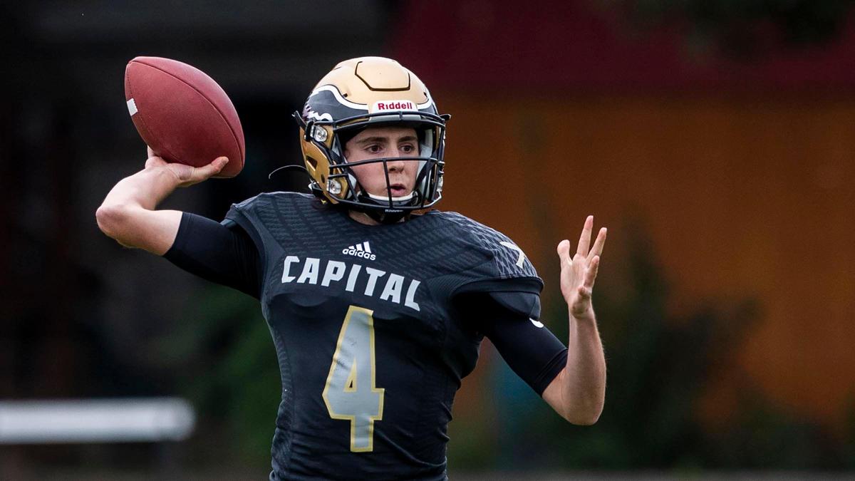 Capital quarterback Max Clark pulls up for a pass in the Eagles’ 55-12 win over Skyview on Friday.