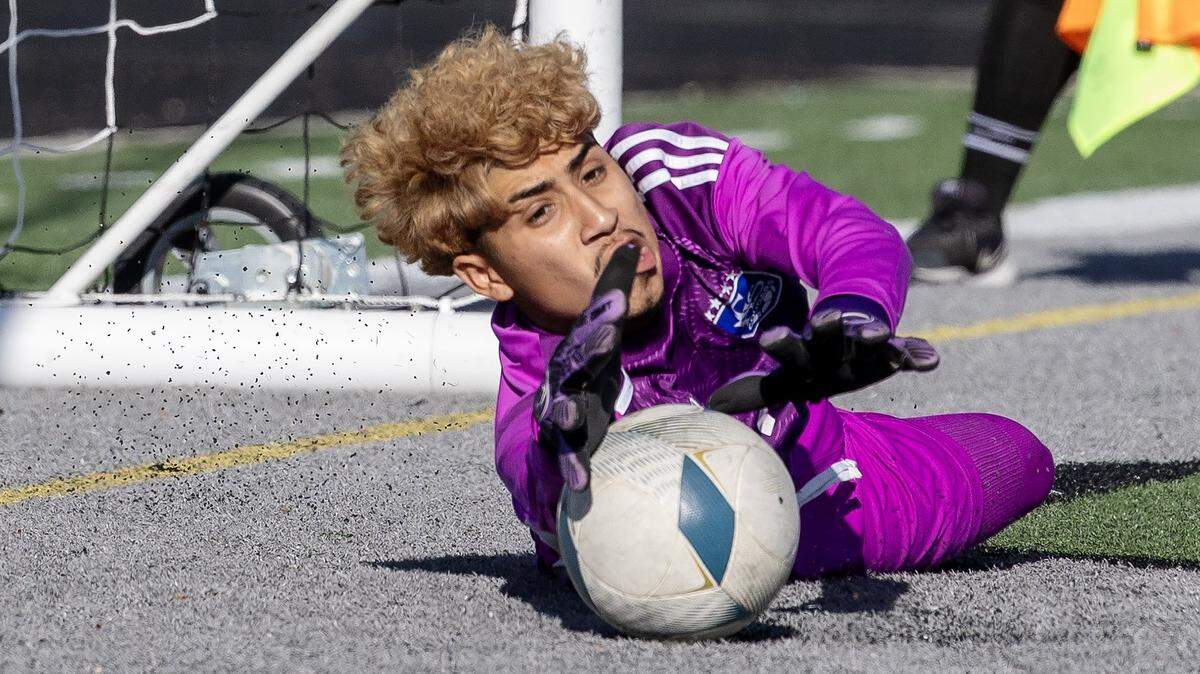 Caldwell senior Horacio Hernandez saves a goal during penalty kicks in their game against Mountain View in the first round of the state championship.