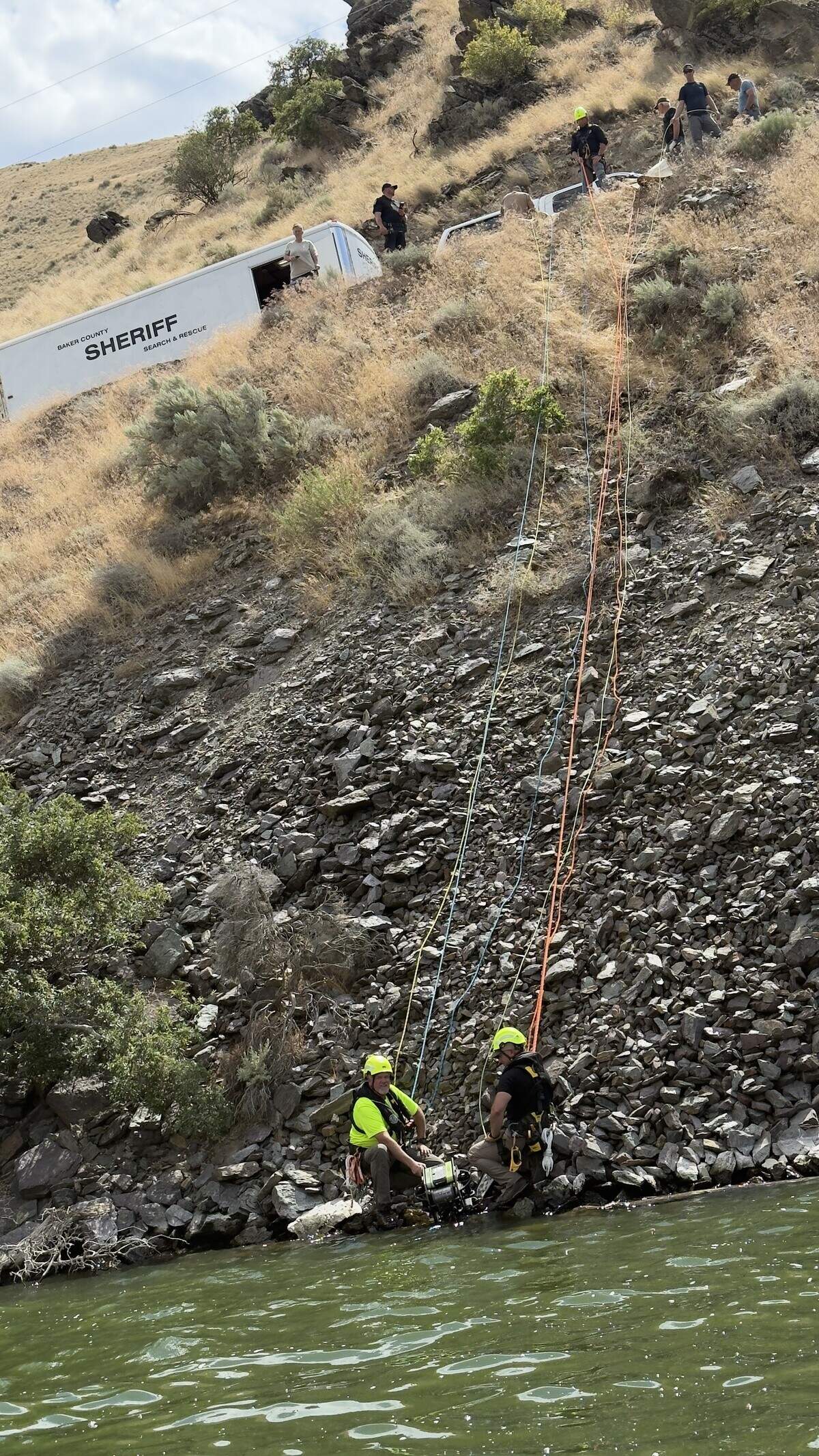 Members of the Baker County Search and Rescue team worked to recover a submerged vehicle from the Snake River north of Huntington, Oregon, on July 6, 2026. The late model Honda Accord was reported stolen out of Caldwell, Idaho, in June.
