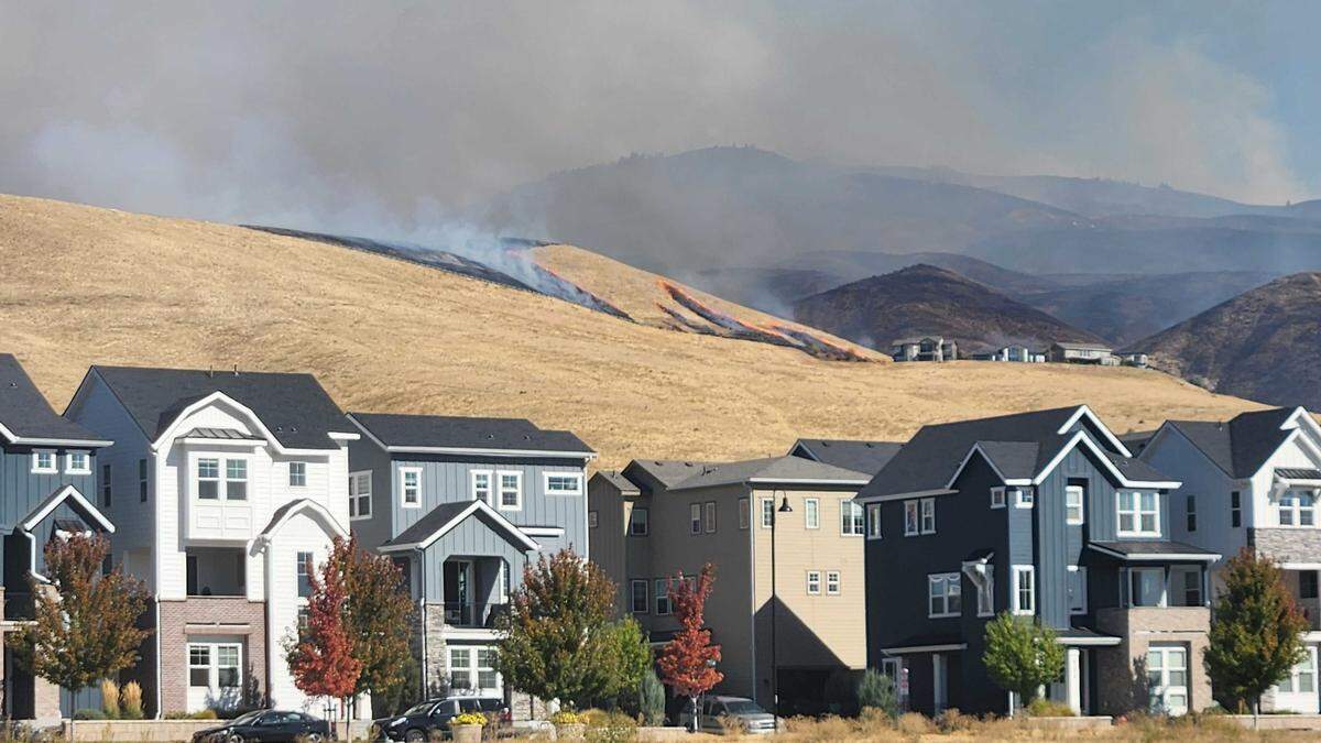 The Valley Fire burns near subdivisions along Warm Springs Avenue in the Boise Foothills Friday.