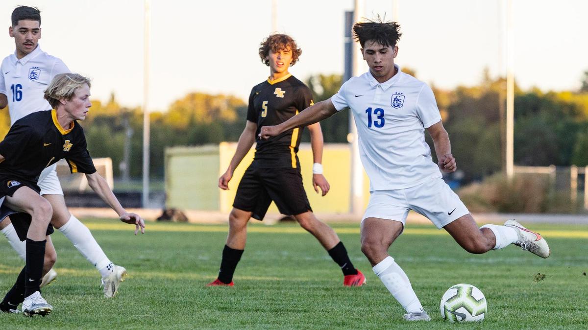 Caldwell forward Jaden Pineda, right, is one of eight returning starters for the Cougars as they try to repeat as 4A District Three champs.