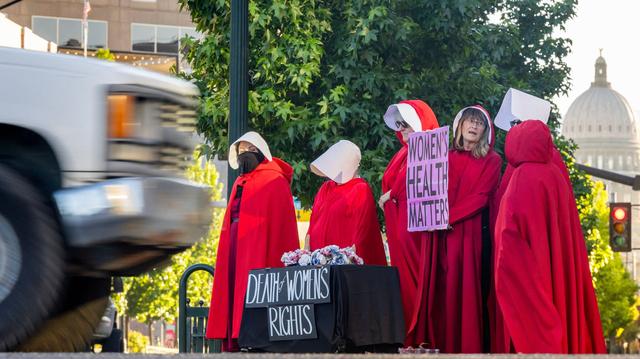 A group of women dressed as characters from Margaret Atwood’s dystopian novel, “The Handmaid’s Tale,” protest the current state of women’s reproductive rights in Idaho in this file photo.