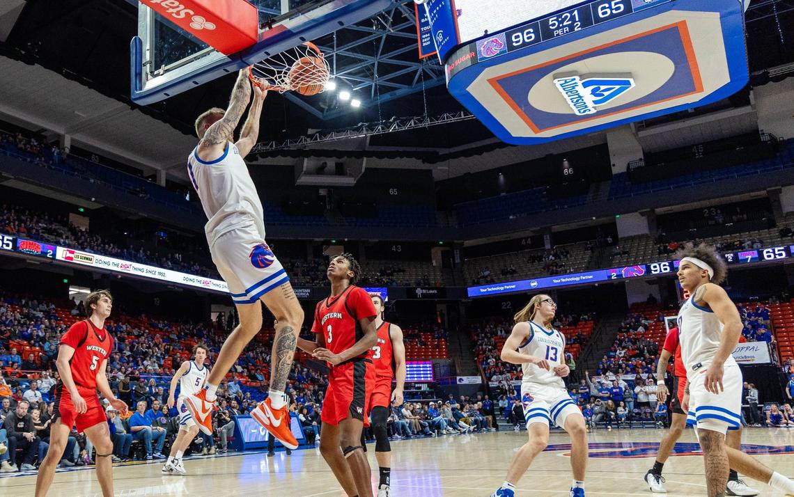 Boise State forward Cam Martin scores in the second half of their basketball game against Western Oregon in December at ExtraMile Arena.