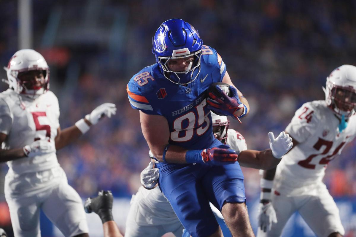 Boise State tight end Matt Lauter is typically the one carrying the ball, but he was blocking for Marco Notarainni against San Diego State.