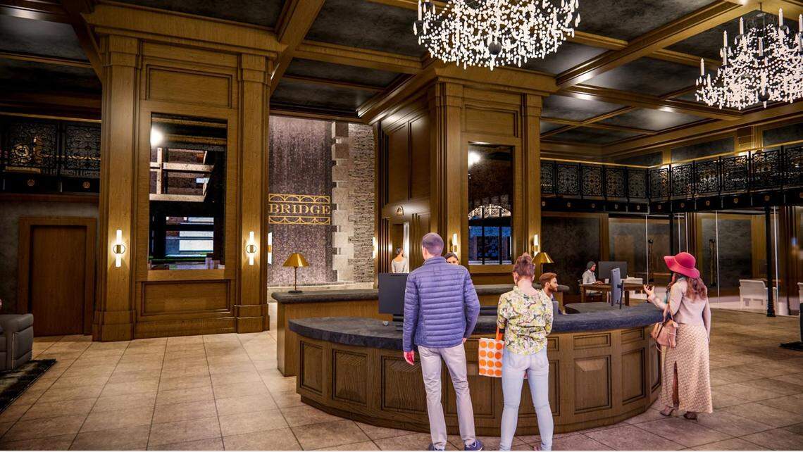 The rendering shows a lobby section of the Bridge at The Village.