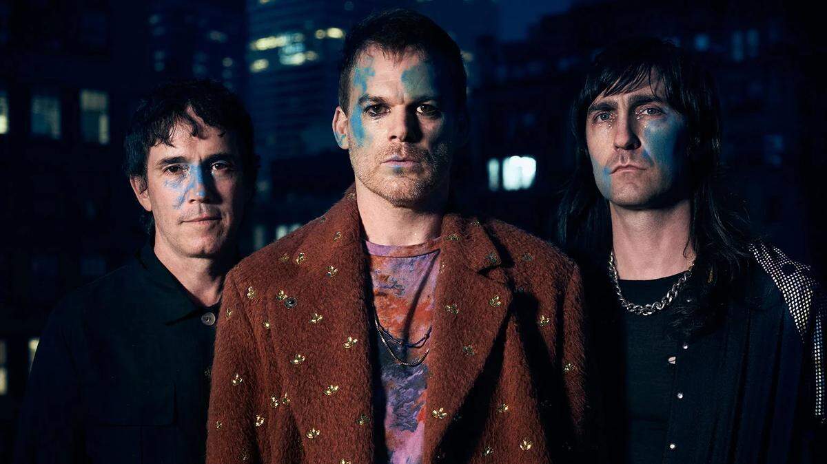 Actor Michael C. Hall, center, handles vocals for Princess Goes to the Butterfly Museum.