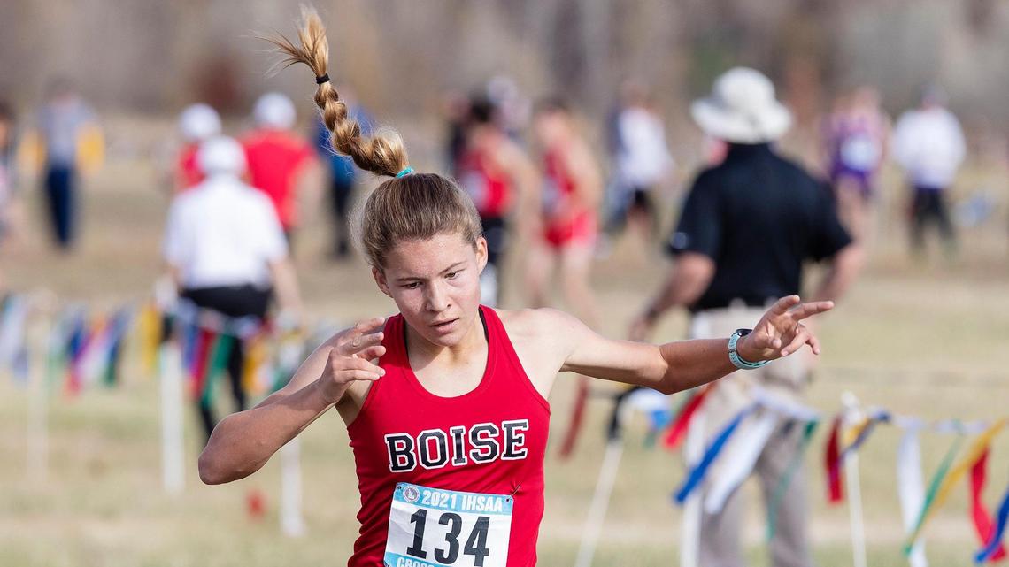 Boise’s Allie Bruce sprints to a first-place finish with a time of 17 minutes, 47.9 seconds at the 5A girls state cross country race Friday at Eagle Island State Park.