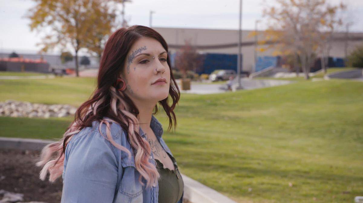 Shasta Groene stands in a park.