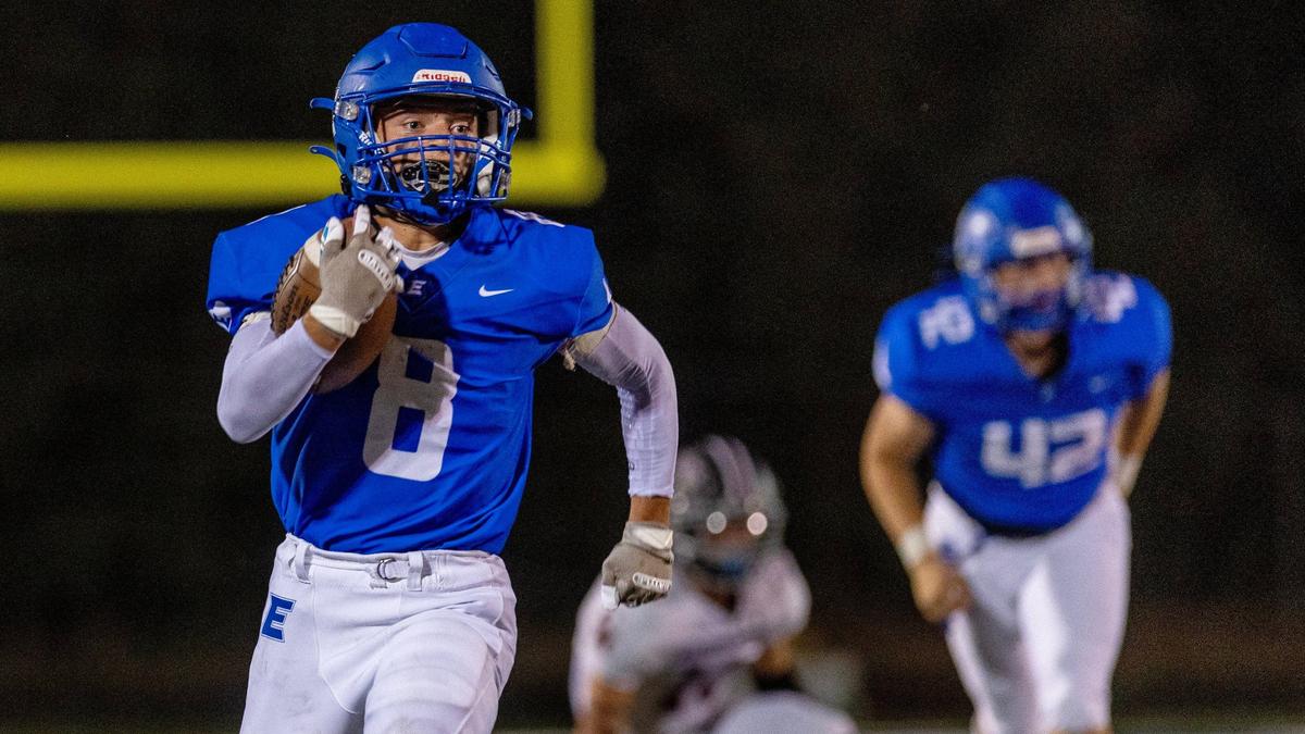Emmett’s Nessen Korell breaks free for a long run against Canyon Ridge in last year’s season opener. The Huskies travel to Canyon Ridge for a rematch Friday. 