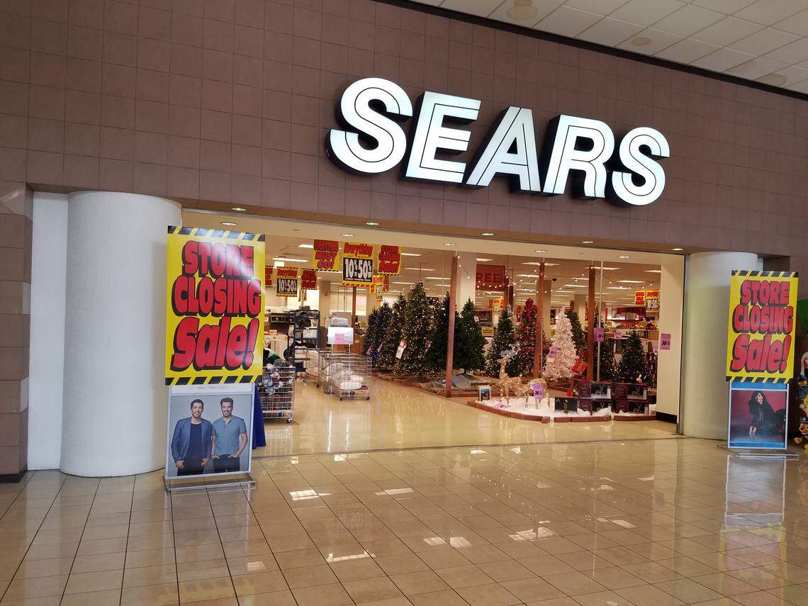 Signs in the Sears store at the Boise Towne Square announce the store’s pending closure. Prices are advertised as 10 to 50 percent off.